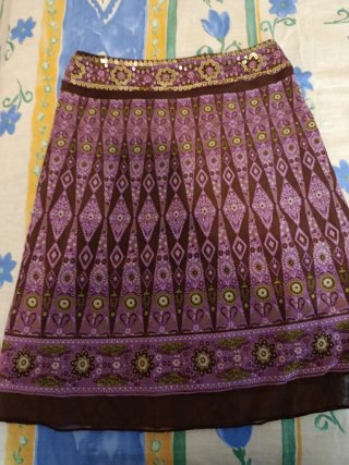 Falda, camisa, vestido corto y vestido largo