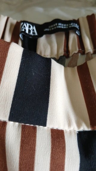 Pantalón ancho rayas beige y marrón