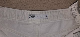 Pantalones cortos blancos rasgados T. XS