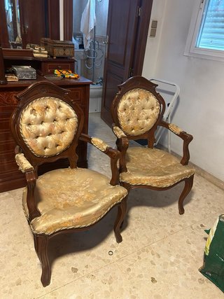 Pareja de sillones antiguos capitoné