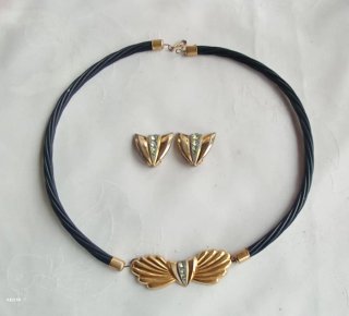 Conjunto de Colgante y Pendientes
