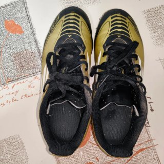 Botines de fútbol Adidas Messi Dorados