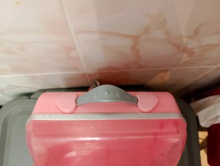 Mochila de juguete rosa