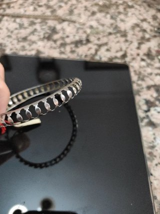 Pulsera de plata con diseño calado