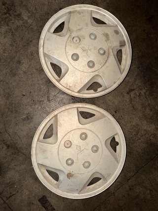 2 Tapacubos Montero IO