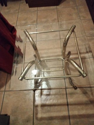 Mesa de centro cristal y metal dorado
