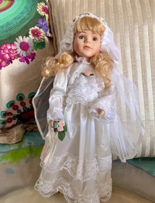 Colección de 4 Muñecas de Porcelana
