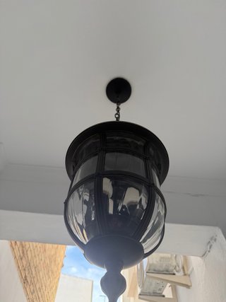 Farol de metal y cristal