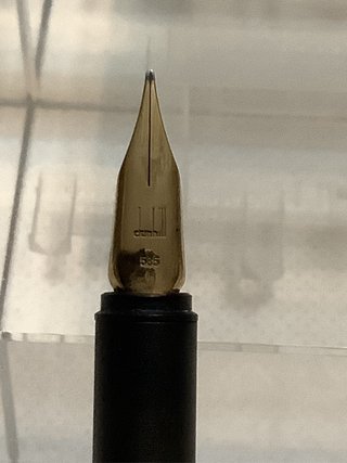 JUEGO DE PLUMA Y BOLIGRAFO “DUNHILL” DE PLATA.