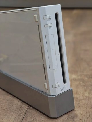 Nintendo Wii con 2 mandos y 2 juegos