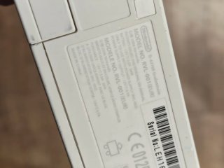 Nintendo Wii con 2 mandos y 2 juegos