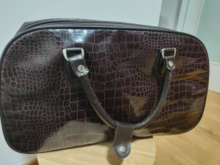 Bolso de viaje marrón efecto piel