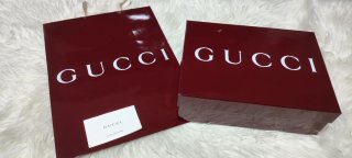 Caja y bolsa Gucci