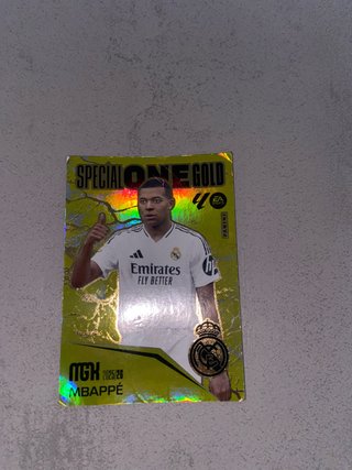 Carta Panini Mbappe MGK Special ONE Gold 2025-26