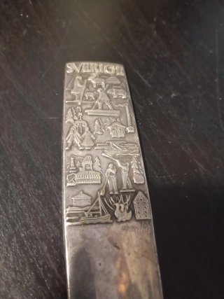 Tagliacarte antico con decorazioni