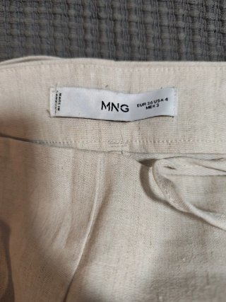 Pantalón corto de lino beige