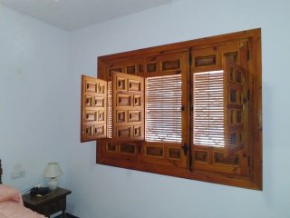 Ventanas de madera con cuarterones