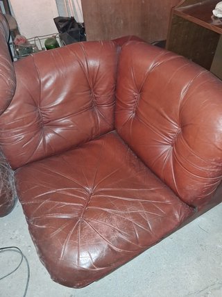 4 poltrone in pelle vintage degli anni 70