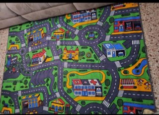 Alfombra infantil ciudad con carreteras