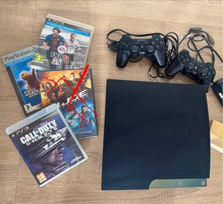 Consola PlayStation 3 (PS3) con mandos y juegos