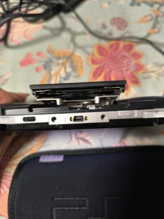 Sony PSP-1004 Negra + Cargador y Funda