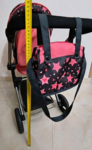Carro de muñecas con estrellas