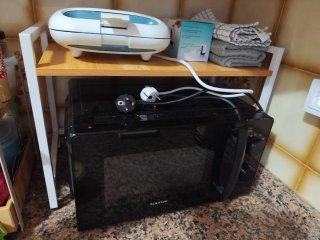 Mueble organizador sobre microondas