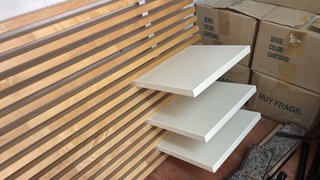 Cabecero Ikea de listones con mesitas