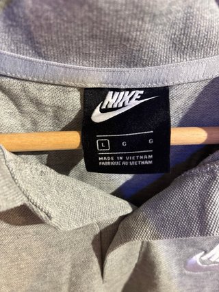 Polo Nike gris