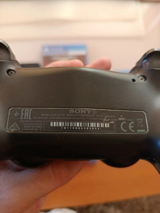Consola PlayStation 4 con Mando y 5 Juegos