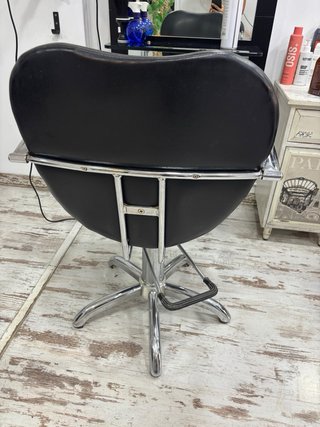 Sillón de peluquería negro