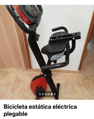 Bicicleta estática con respaldo
