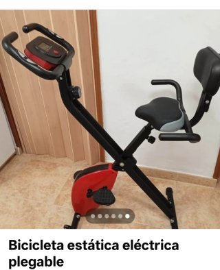 Bicicleta estática con respaldo