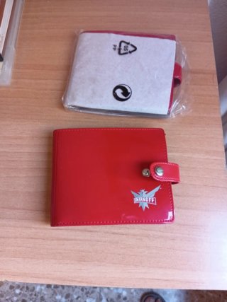 2 Carteras Smirnoff Rojas