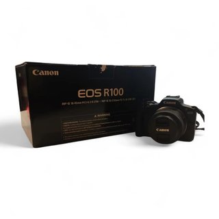 CAMARA CANON EOS R100 + OBJETIVO 18-45MM +  CAJA