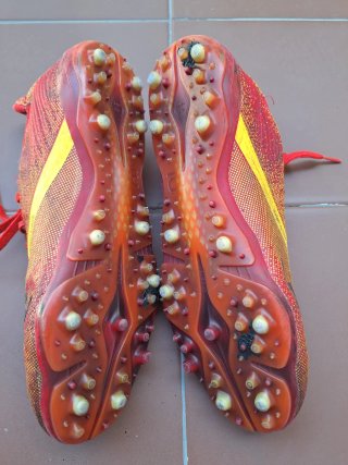 T. 38. Botas de tacos Fútbol 11 Rojas. Kipsta