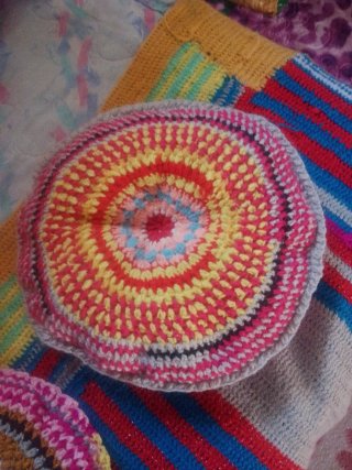 2 Cojines Redondos Tejidos