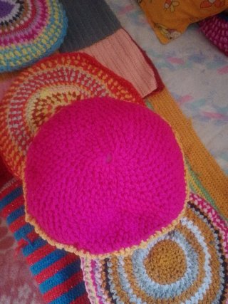 2 Cojines Redondos Tejidos