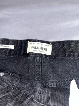 Pantalones cortos rotos negros y blancos