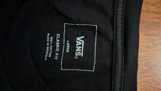 Camiseta Vans Off The Wall Vintage Negra