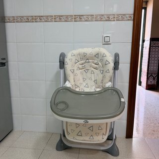 Trona de bebé con cojín estampado como nueva