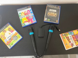 Pack SingStar PS2 con 2 Micrófonos y 4 Juegos