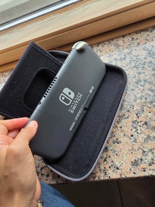 Nintendo Switch Lite Gris + Funda Original