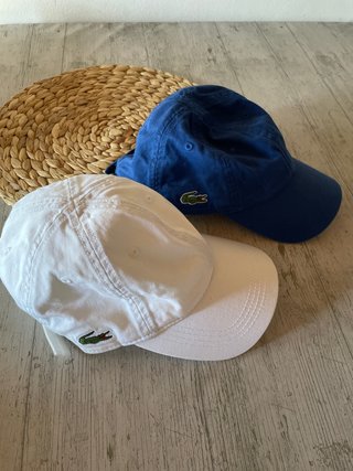 Dos Gorras Lacoste