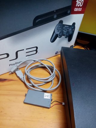 PS3 + 2 mandos + 3 juegos + bateria