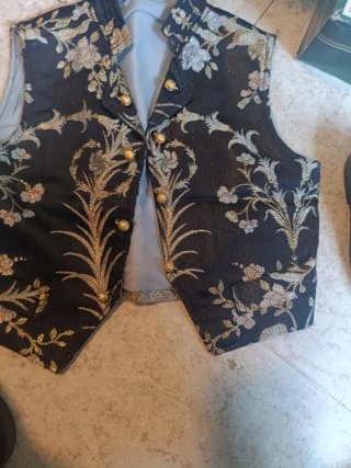 Conjunto chaleco y zapatos Toyta