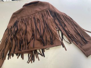 Chaqueta corta ante sintético flecos