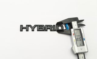 EMBLEMA LOGO NEGRO HYBRID TOYOTA 132x17mm