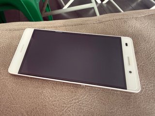 Huawei Teléfono Dorado y Blanco