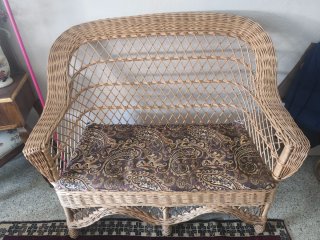 Sillón de dos plazas de mimbre